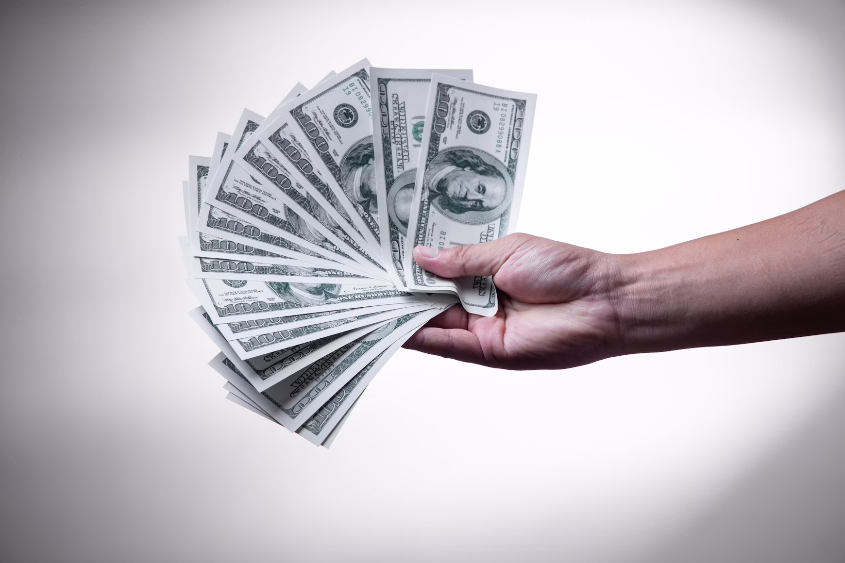 Bundles of 100 dollar bills